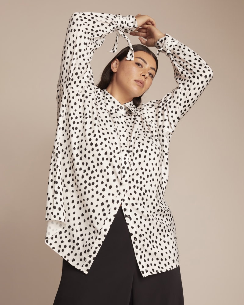Front of a model wearing a size 14 Stevie Shirt in White by 11 Honoré Collection. | dia_product_style_image_id:244547